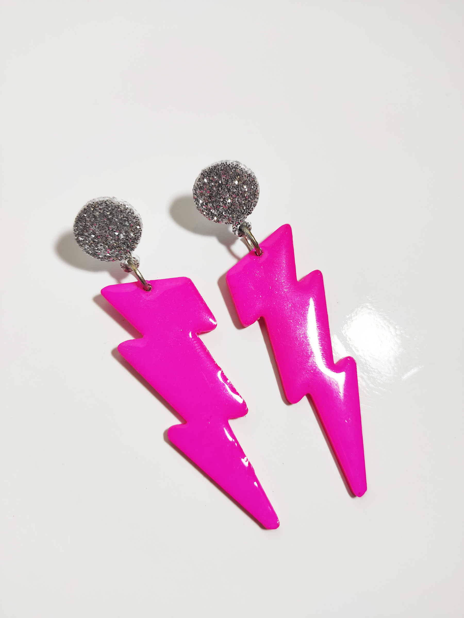 Pendientes rayos  rosa fluor